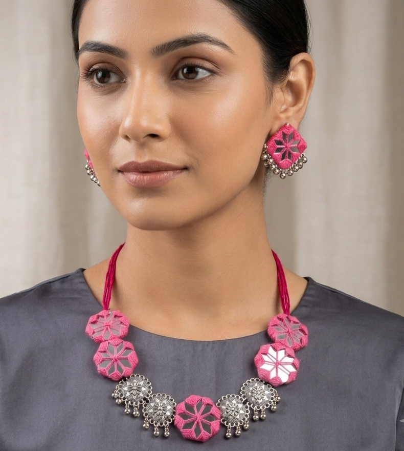 Vibrant Pink Handcrafted Thread and Mirror Work Necklace Set with Oxidised Silver Details 1 handcrafted mirror work jewelry set